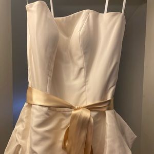 Beautiful champagne colored wedding gown with sash